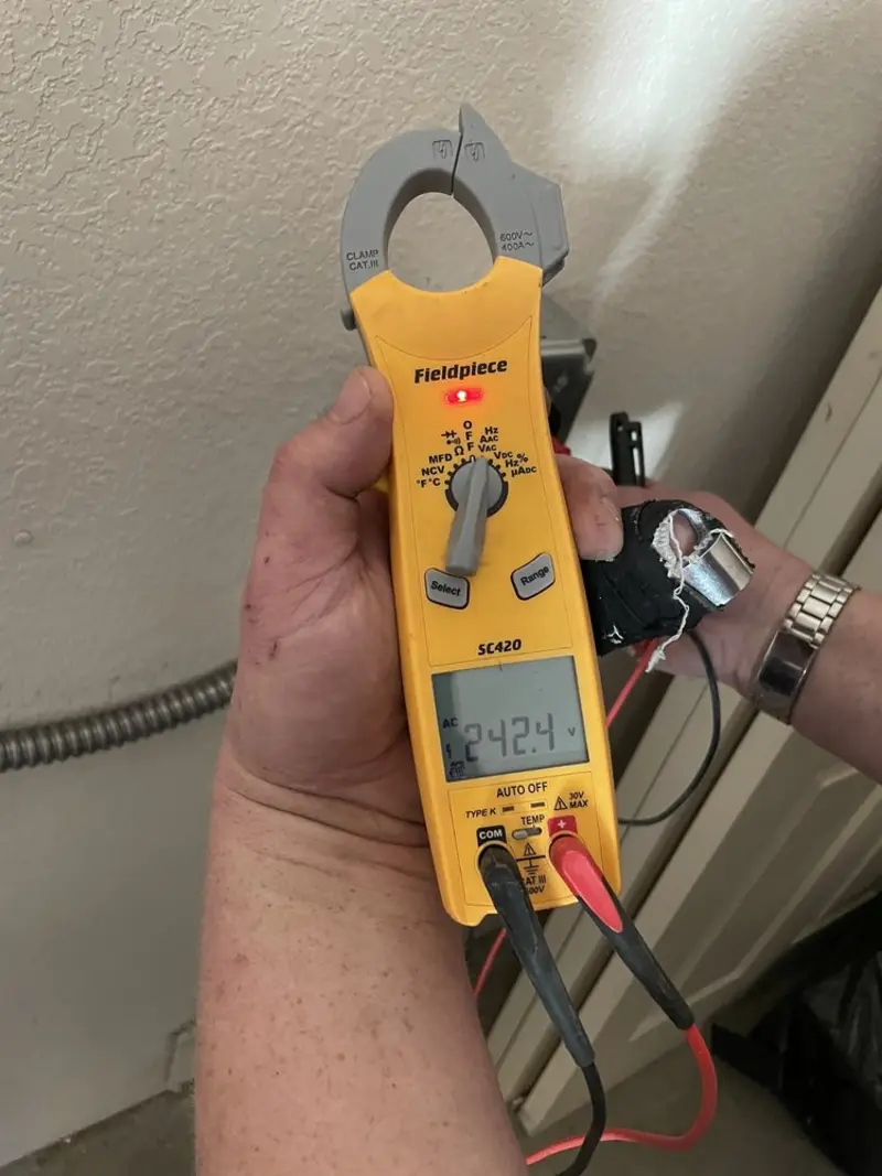 Voltage testing with clamp meter during Circuit Breaker Repair in White Oak